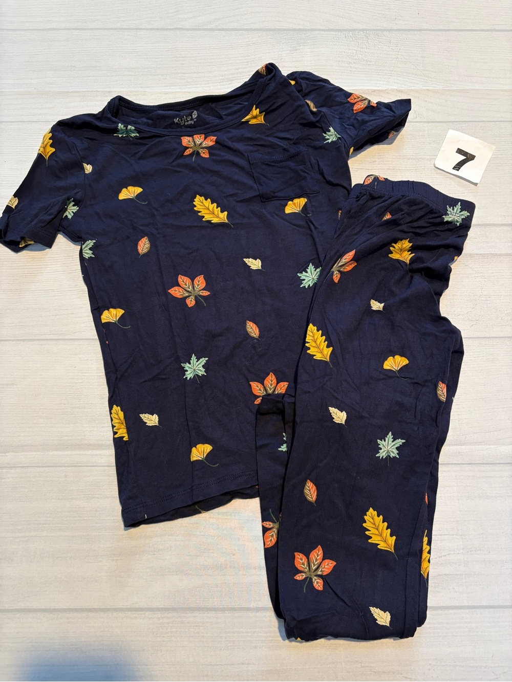Kyte BABY Navy Blue Kids Pajama Set with Yellow, Orange, Green Leaf Print